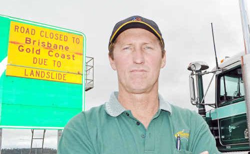 Warwick’s Frasers Livestock Transport workshop manager Mark Collins feels the pinch of a three-hour round-trip detour through Toowoomba as a result of The Gap’s landslide closures. Warwick’s Frasers Livestock Transport workshop manager Mark Collins feels the pinch of a three-hour round-trip detour through Toowoomba as a result of The Gap’s landslide closures.